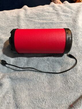 Compact Red Portable Bluetooth Speaker with USB Charging